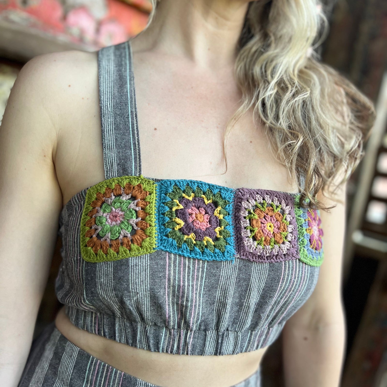 Someone wearing the Granny Square Bandeau Top.