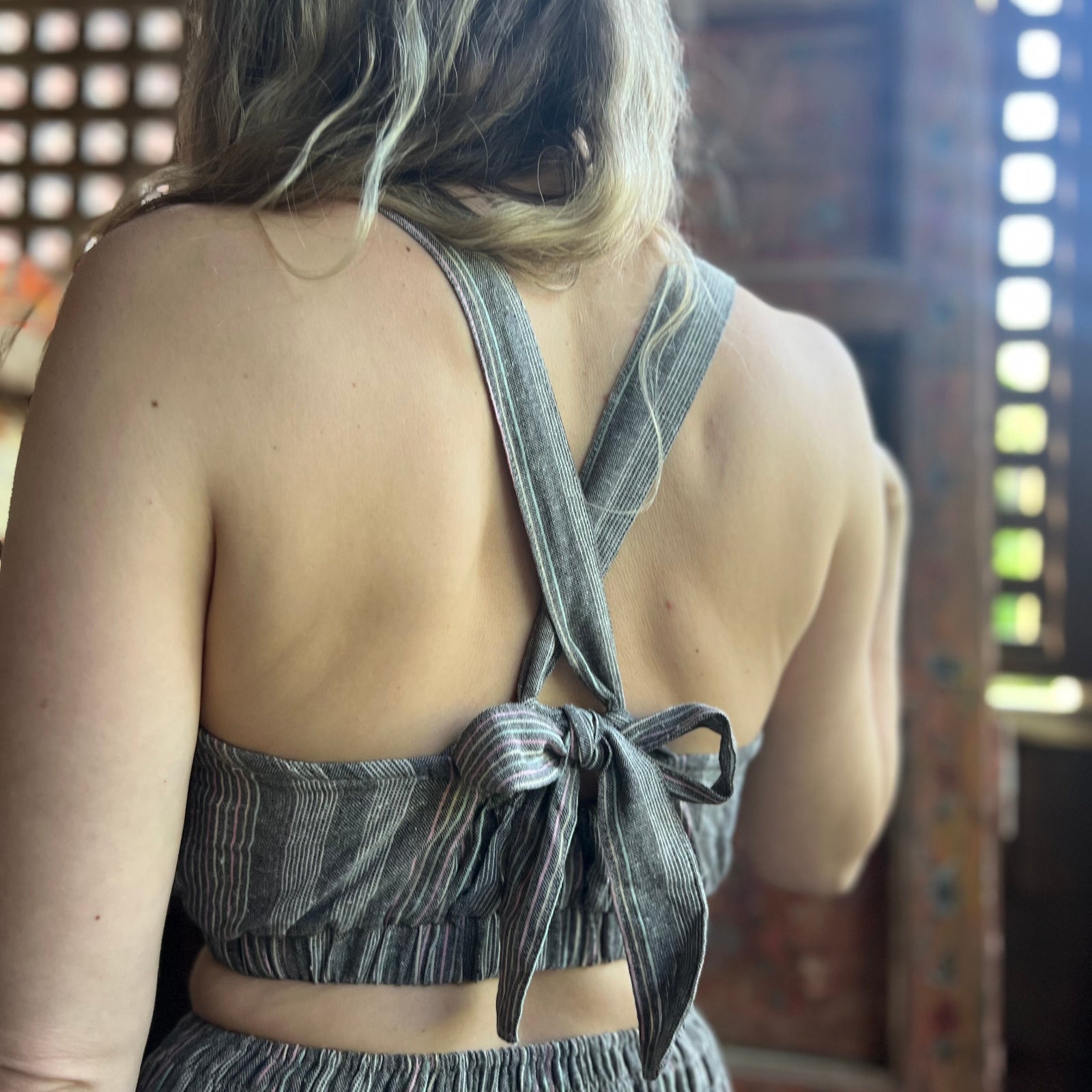 Someone wearing the Granny Square Bandeau Top.