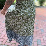 Someone wearing the Celestial Slit Ruffled Maxi Skirt.