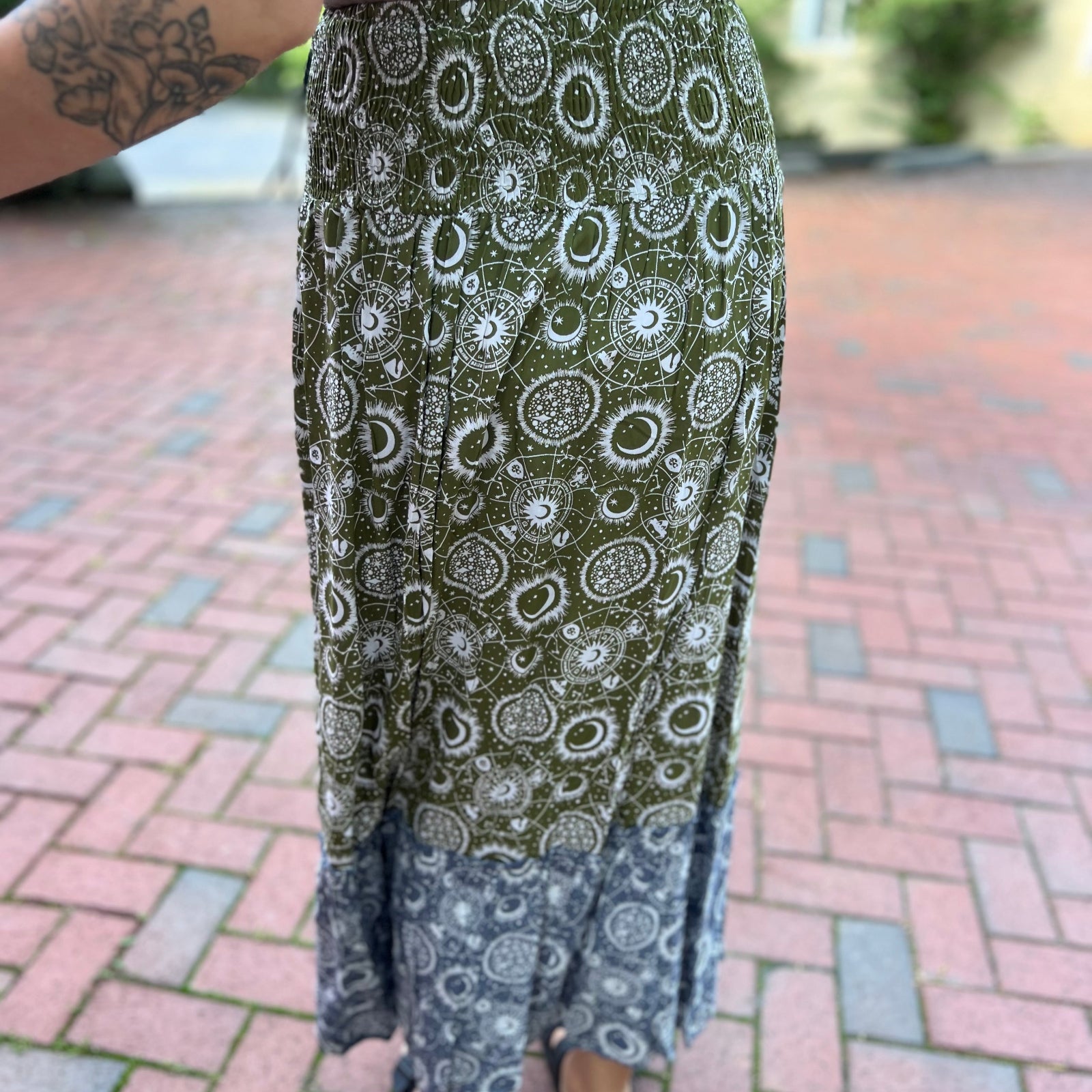 Someone wearing the Celestial Slit Ruffled Maxi Skirt.