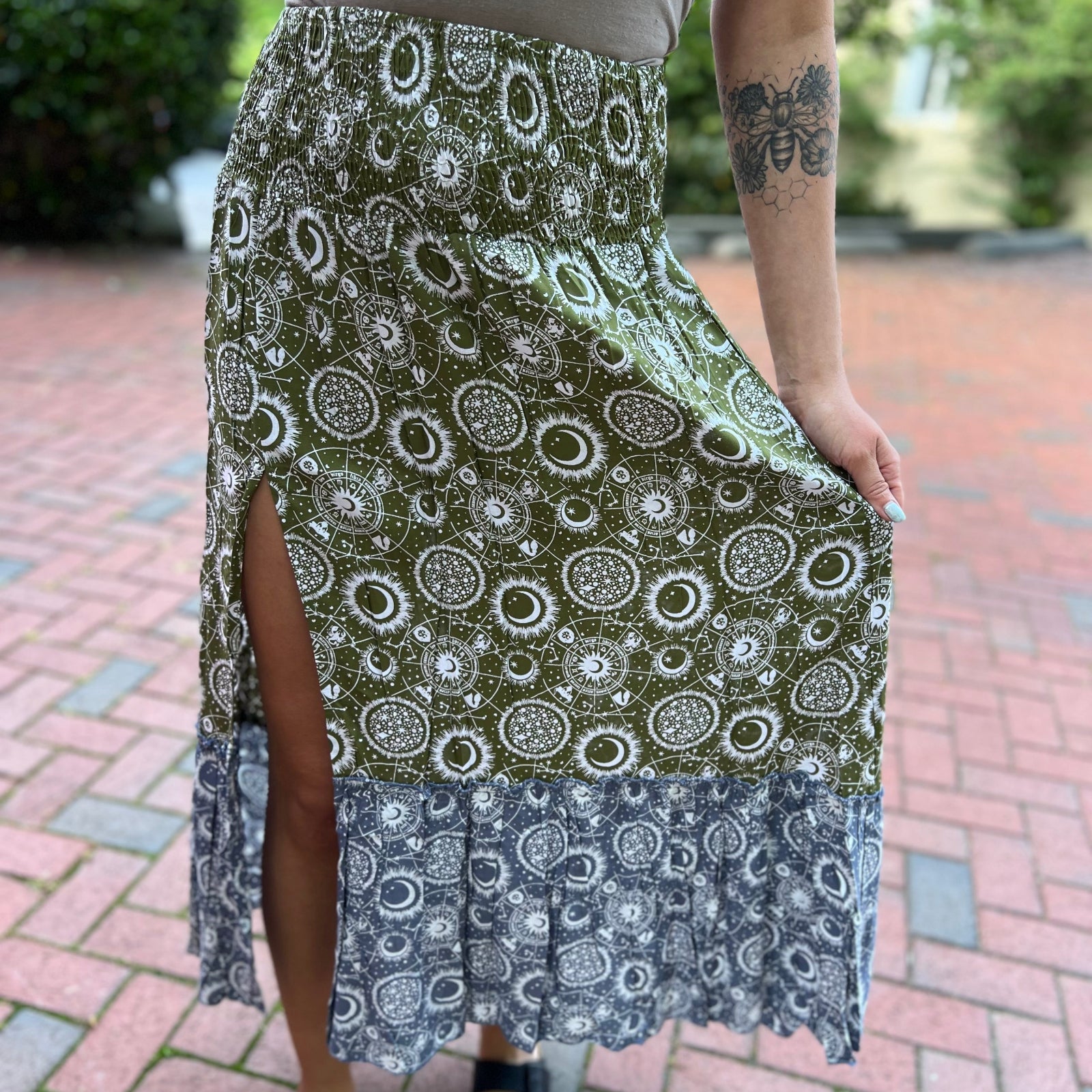 Someone wearing the Celestial Slit Ruffled Maxi Skirt.