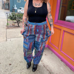 A woman wearing the Cotton Stone Wash OM & Peace Cargo Pants.