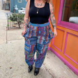 A woman wearing the Cotton Stone Wash OM & Peace Cargo Pants.