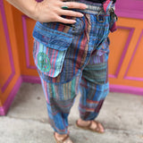 A woman wearing the Cotton Stone Wash OM & Peace Cargo Pants.