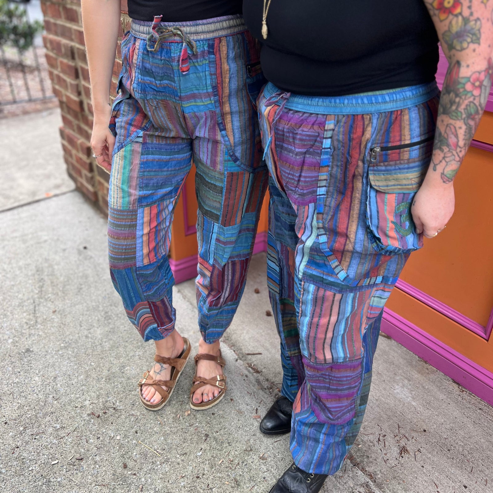 Two women wearing the Cotton Stone Wash OM & Peace Cargo Pants.