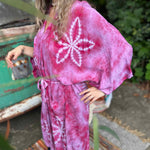 Front pocket feature of hand-dyed green bohemian kimono