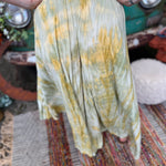 A woman wearing the green Hippie Bohemian Hand Dyed Palazzo Pants in front of a vintage Volkswagen bus.