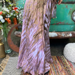 A woman wearing the mauve Hippie Bohemian Hand Dyed Palazzo Pants in front of a vintage Volkswagen bus.