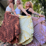 Three women wearing the different colors of the Hippie Bohemian Hand Dyed Palazzo Pants.