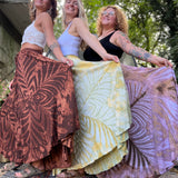 Three women wearing the different colors of the Hippie Bohemian Hand Dyed Palazzo Pants.