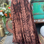A woman wearing the brown Hippie Bohemian Hand Dyed Palazzo Pants in front of a vintage Volkswagen bus.