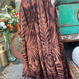 A woman wearing the brown Hippie Bohemian Hand Dyed Palazzo Pants in front of a vintage Volkswagen bus.