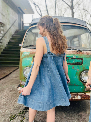 sleeveless denim flare dress with retro vibes