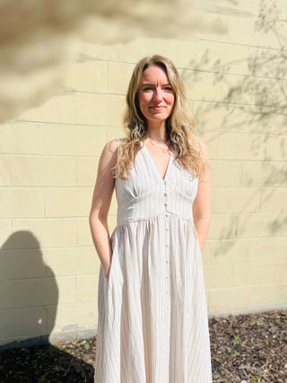 elegant and breezy striped maxi dress with vintage inspired button detail