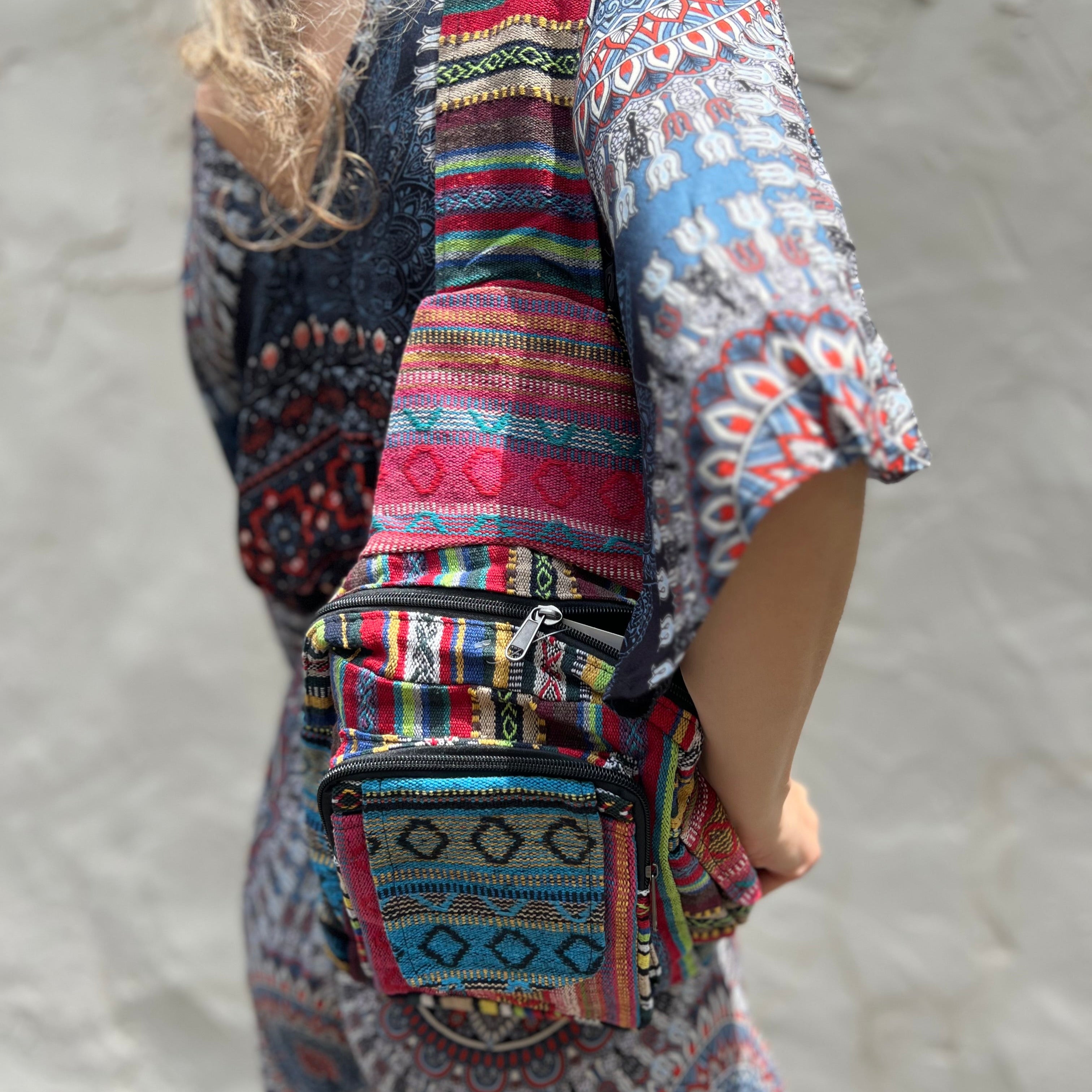 Someone wearing the Cotton Ghery Sling Backpack in front of a white wall.