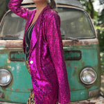 Someone wearing the Sequin Boyfriend Single Hot Pink Blazer in front of a vintage teal Volkswagen bus.