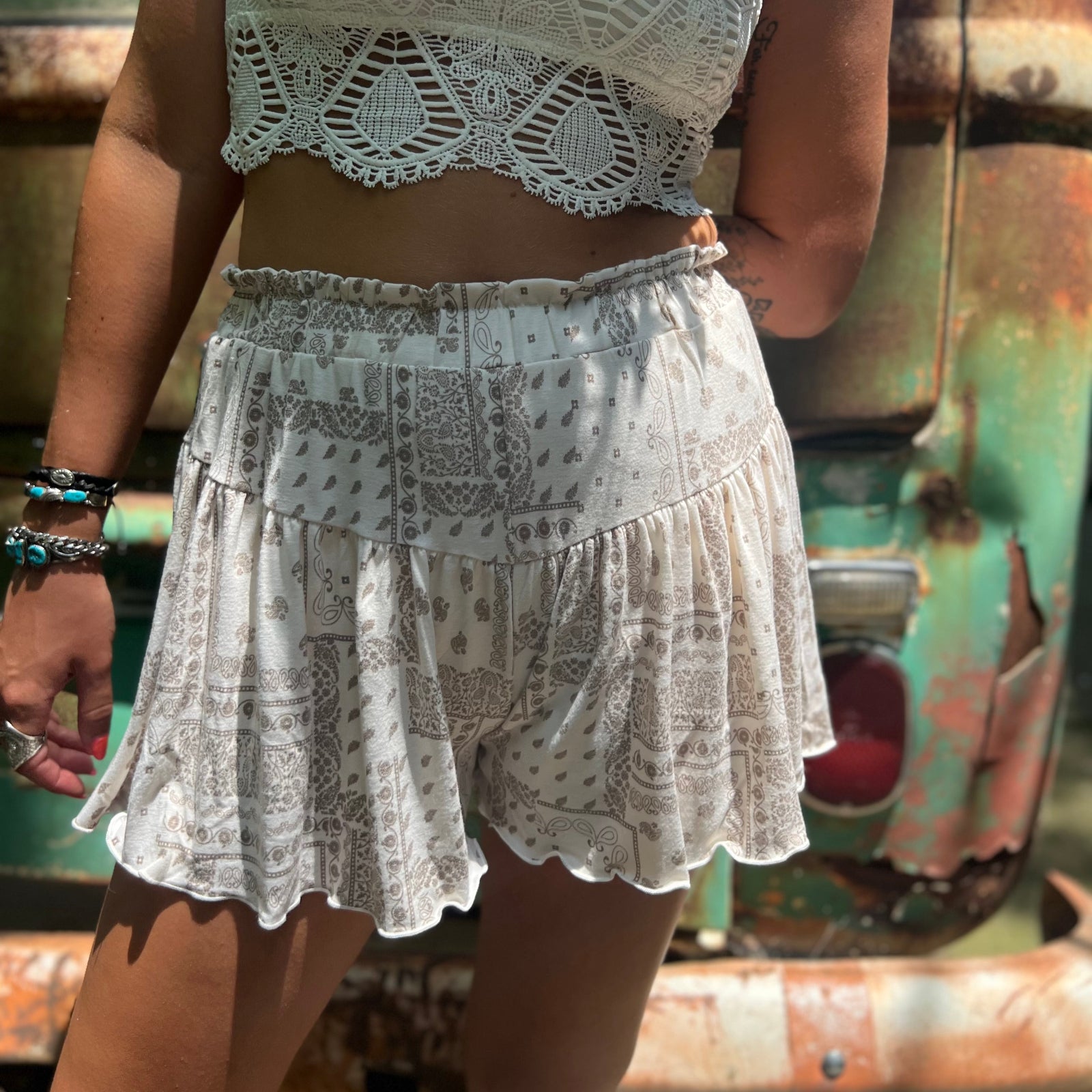 Someone wearing the Taupe Bandana Shorts with Elastic Waist.