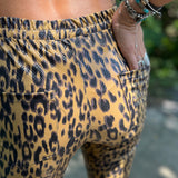 Someone wearing the Mustard Animal Print Bell Bottoms with Elastic Waist.