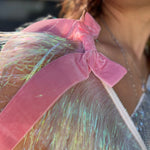 An up-close image of the Bow Bliss Layered Fringe Banner.