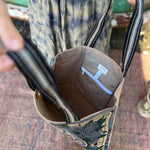 Someone holding a Sun Bandana Blue Canvas Tote Bag open in front of themselves.