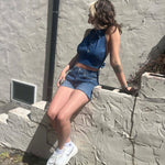 Recycled Denim Halter Top – Upcycled Vintage Shirt on a cream stucko background
