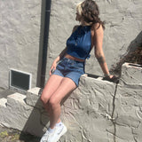 Recycled Denim Halter Top – Upcycled Vintage Shirt on a cream stucko background