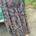 Someone wearing the Slit Ruffled Maxi Skirt.