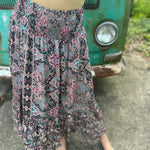 Someone wearing the Slit Ruffled Maxi Skirt.