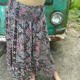 Someone wearing the Slit Ruffled Maxi Skirt.