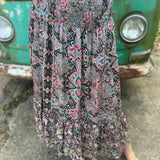 Someone wearing the Slit Ruffled Maxi Skirt.