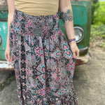 Someone wearing the Slit Ruffled Maxi Skirt.