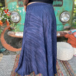 A woman wearing the navy Hippie Bohemian Hand Dyed Palazzo Pants in front of a vintage Volkswagen bus.