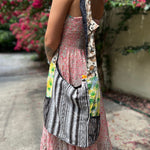 Someone wearing the Cotton Hemp Peace Sing Mushroom Shoulder Bag.