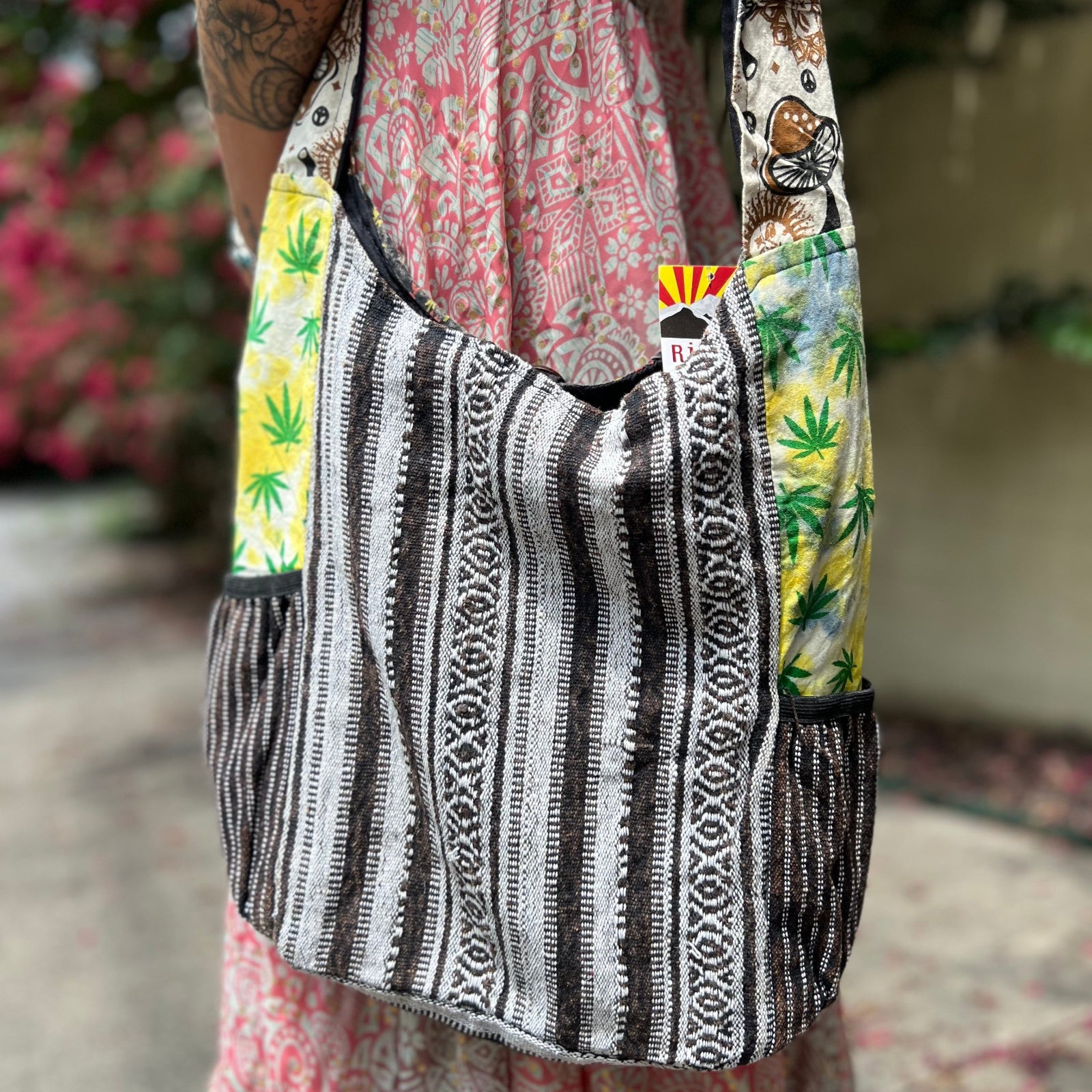 Someone wearing the Cotton Hemp Peace Sing Mushroom Shoulder Bag.