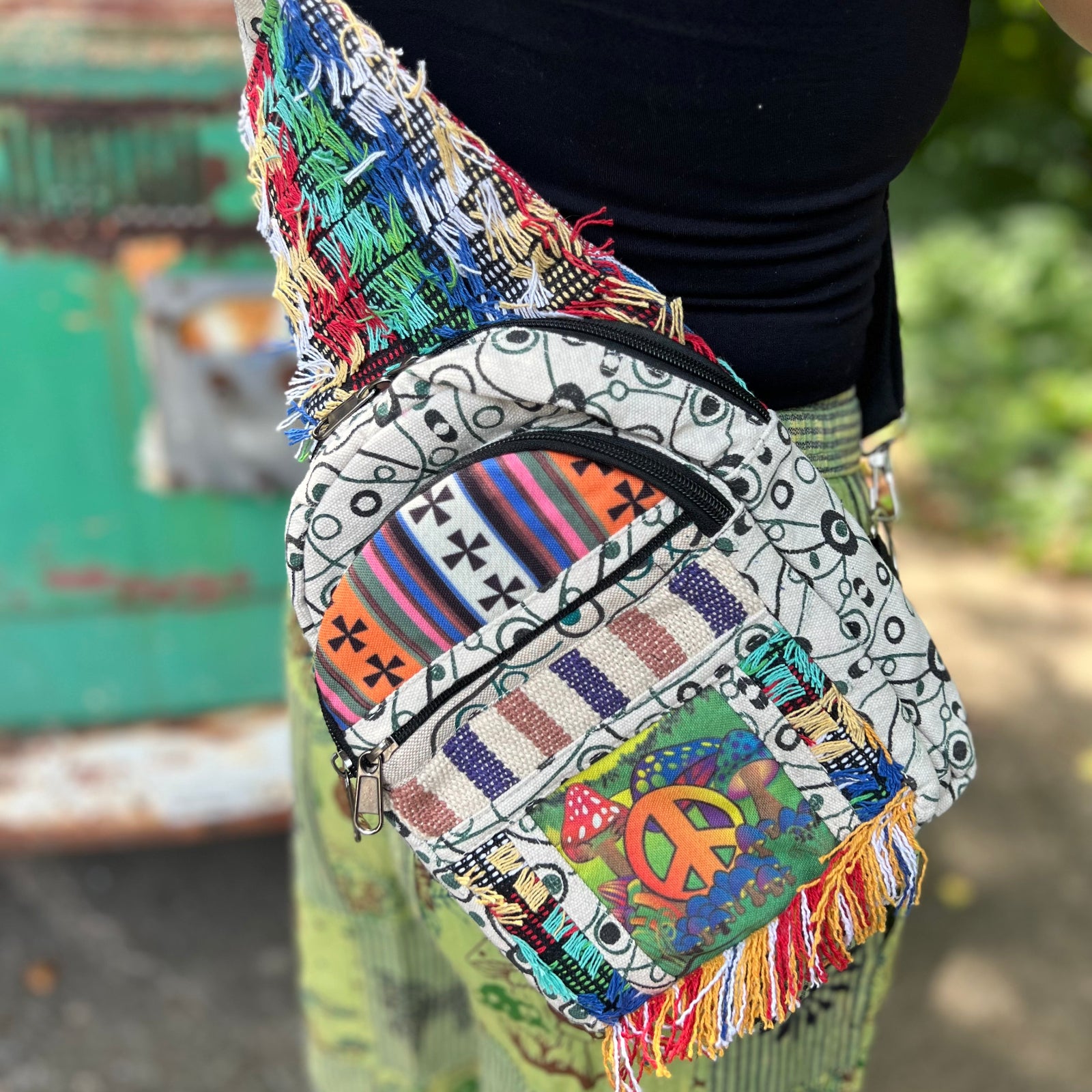 Someone wearing the Cotton Multi Patch Eyelash Fringe Crossbody Bag.