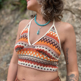 Someone wearing the Bohemian Crisscross Halter Bralette Top.