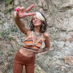 Someone wearing the Bohemian Crisscross Halter Bralette Top.