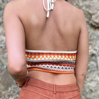 Someone wearing the Bohemian Crisscross Halter Bralette Top.