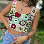 Someone wearing the white Handmade Boho Crochet Design Camisole in front of an old teal Volkswagen bus.