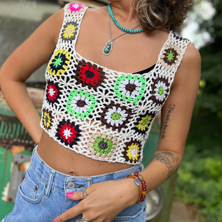 Someone wearing the white Handmade Boho Crochet Design Camisole in front of an old teal Volkswagen bus.