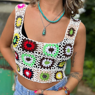 Someone wearing the white Handmade Boho Crochet Design Camisole in front of an old teal Volkswagen bus.