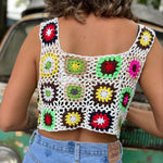Someone wearing the white Handmade Boho Crochet Design Camisole in front of an old teal Volkswagen bus.