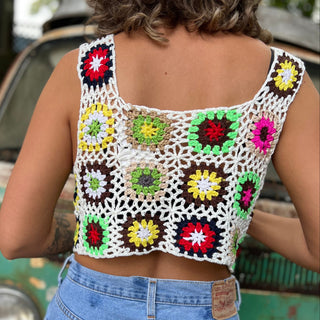 Someone wearing the white Handmade Boho Crochet Design Camisole in front of an old teal Volkswagen bus.
