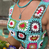 An up close image of someone wearing the blue Handmade Boho Crochet Design Camisole.