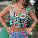 Someone wearing the blue Handmade Boho Crochet Design Camisole in front of an old teal Volkswagen bus.