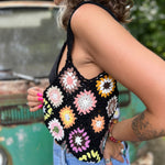 Someone wearing the black Bohemian Handmade Crochet Bag.