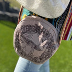 A woman wearing the mushroom Bohemian Round Print Cotton Crossbody Bag.