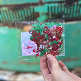 Someone holding the Naughty or Nice 200 Piece Confetti.