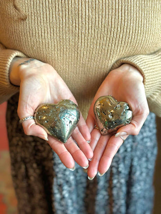 pyrite crystal hearts in palms