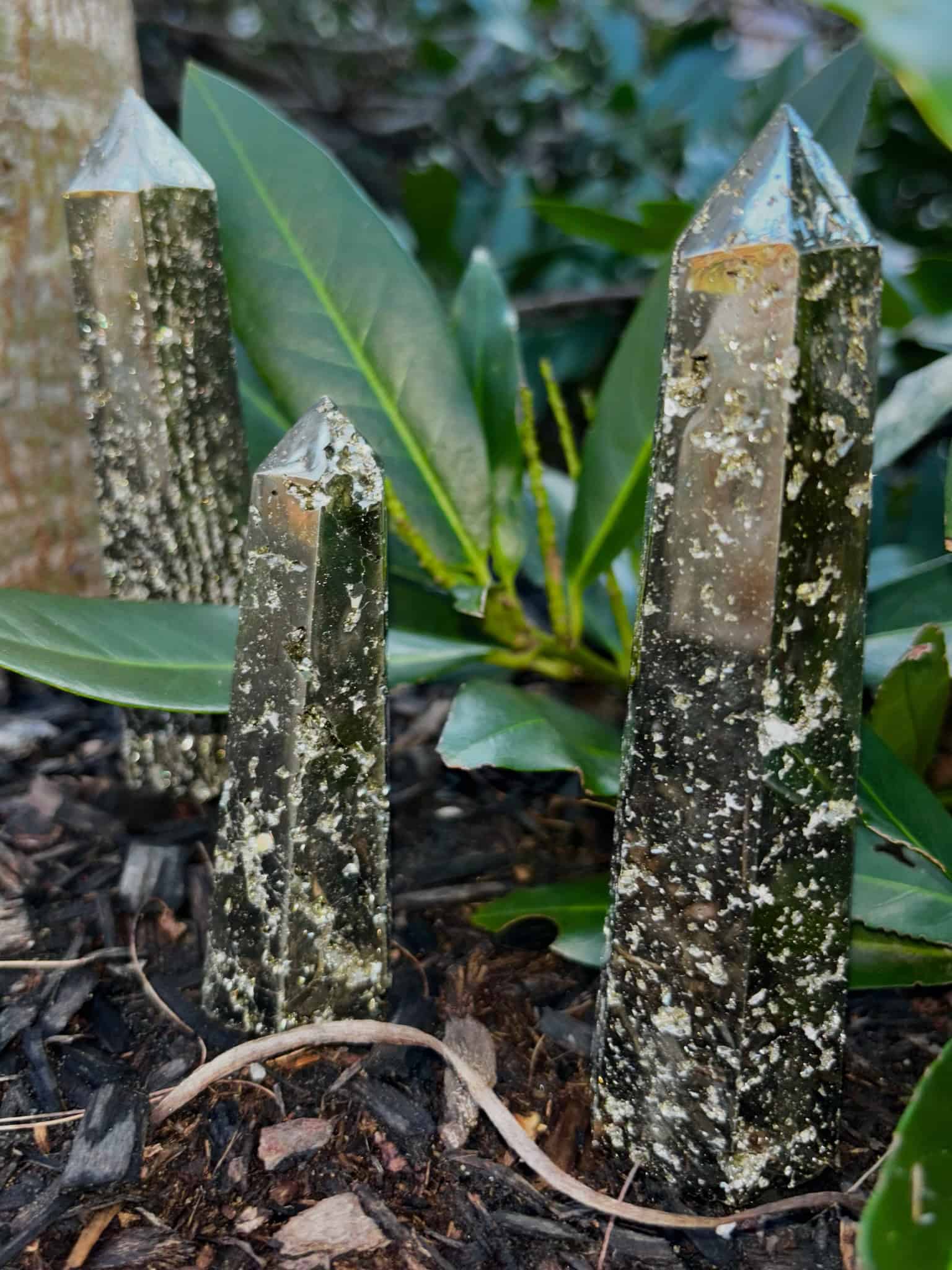 3 pyrite towers in mulch